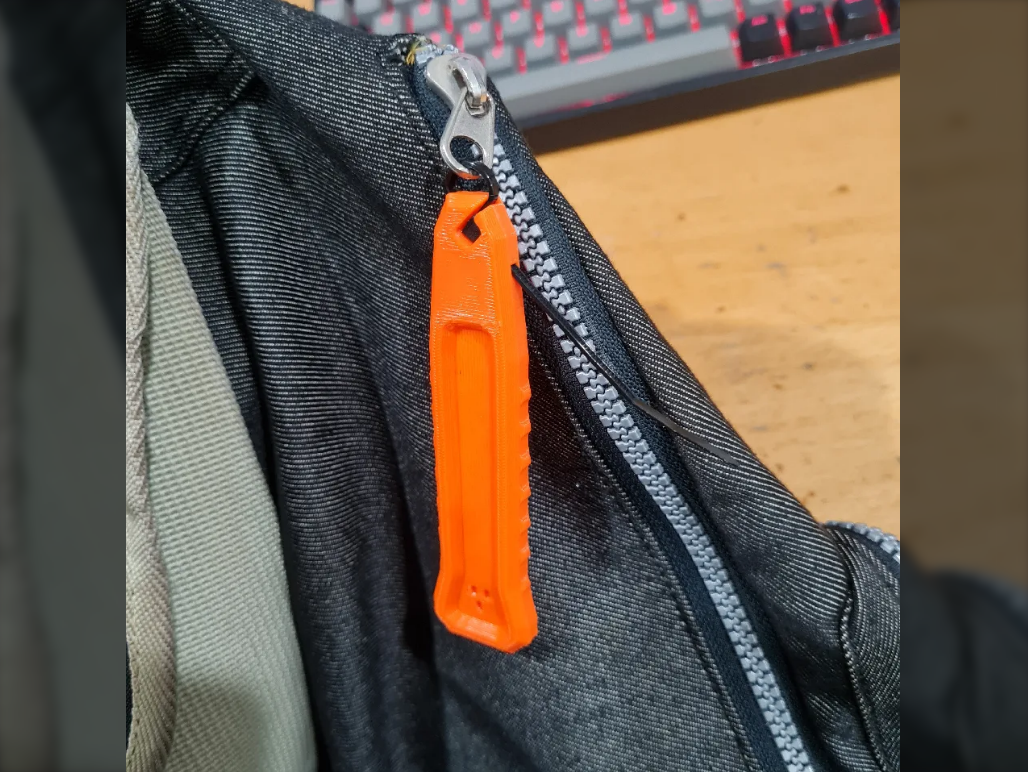 Rapid Access Zipper Pull Tab